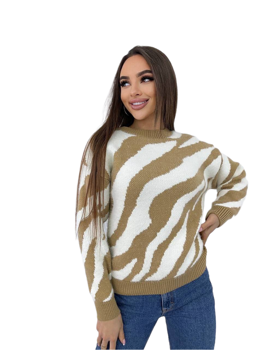 Woman wearing a zebra print sweater on a white background