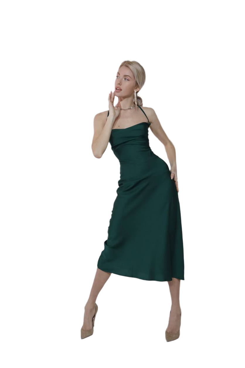 Woman wearing a green dress on a white background