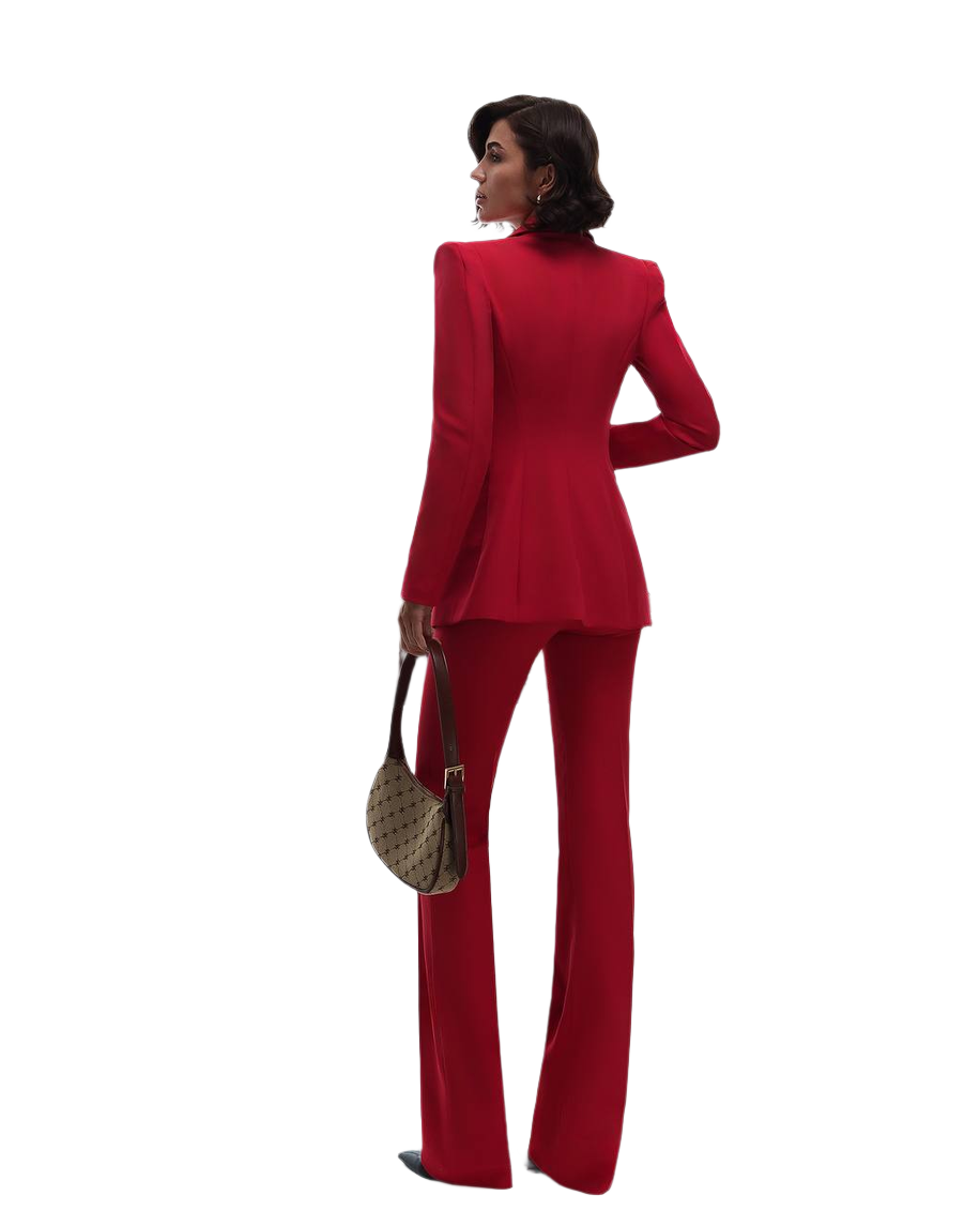 Woman wearing a red suit with a white background