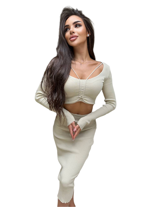 Woman wearing a beige long-sleeve top and skirt set on a white background