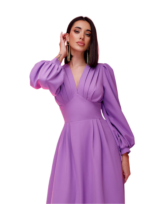 Woman wearing a purple dress on a white background