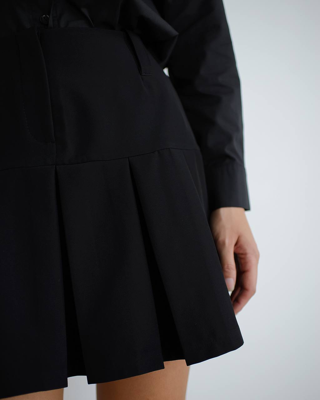 Black coat with a white background