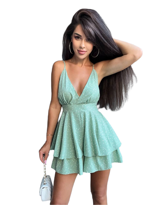 Woman wearing a light blue dress with a white background