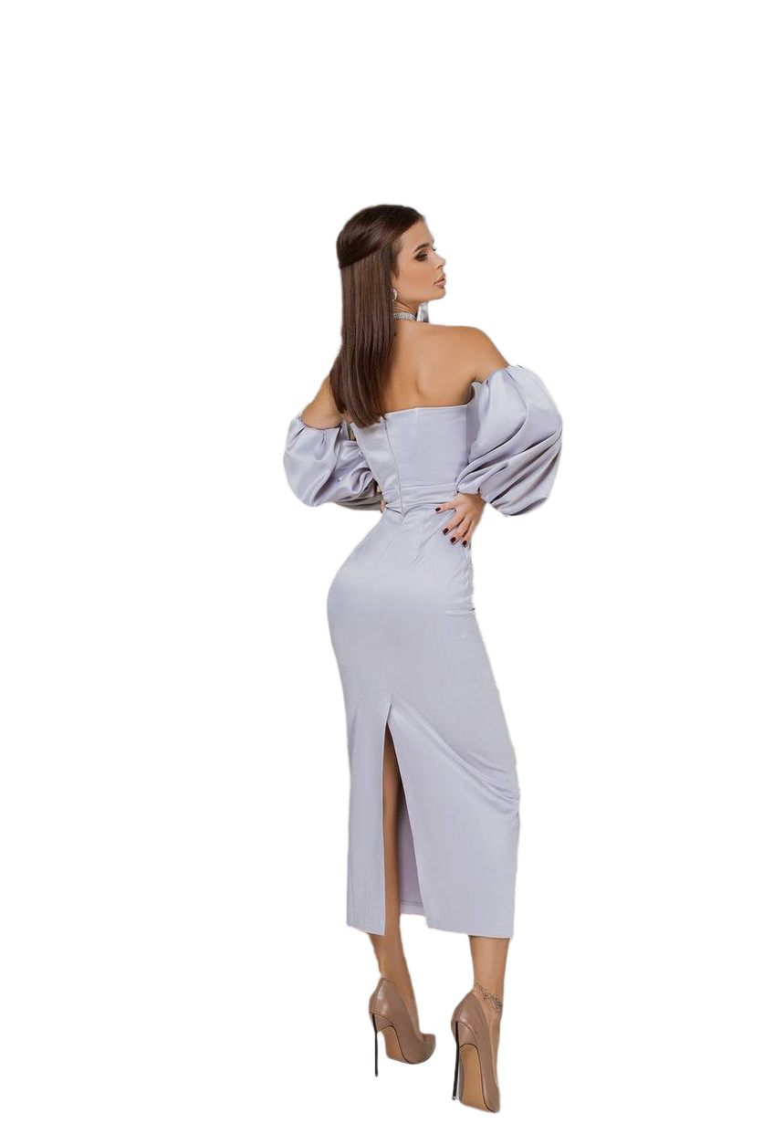 Woman wearing a light gray off-shoulder dress with a high slit on a white background