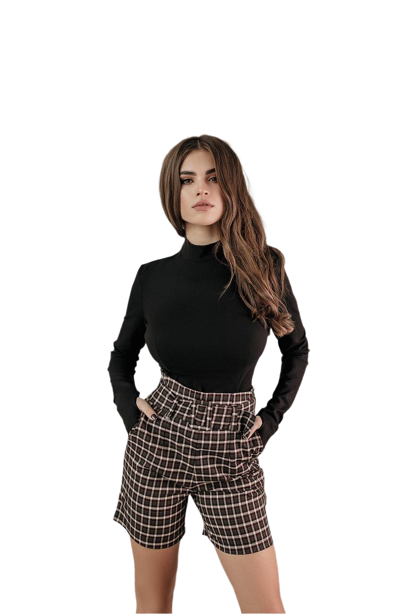 Woman wearing a black turtleneck and plaid shorts on a white background