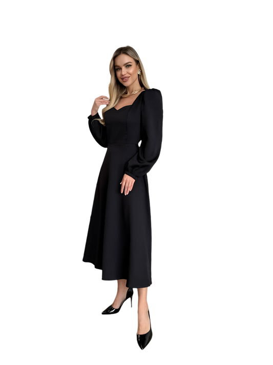 Woman wearing a black dress on a white background