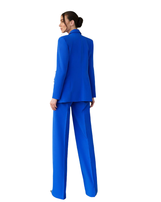 Woman wearing a blue suit on a white background