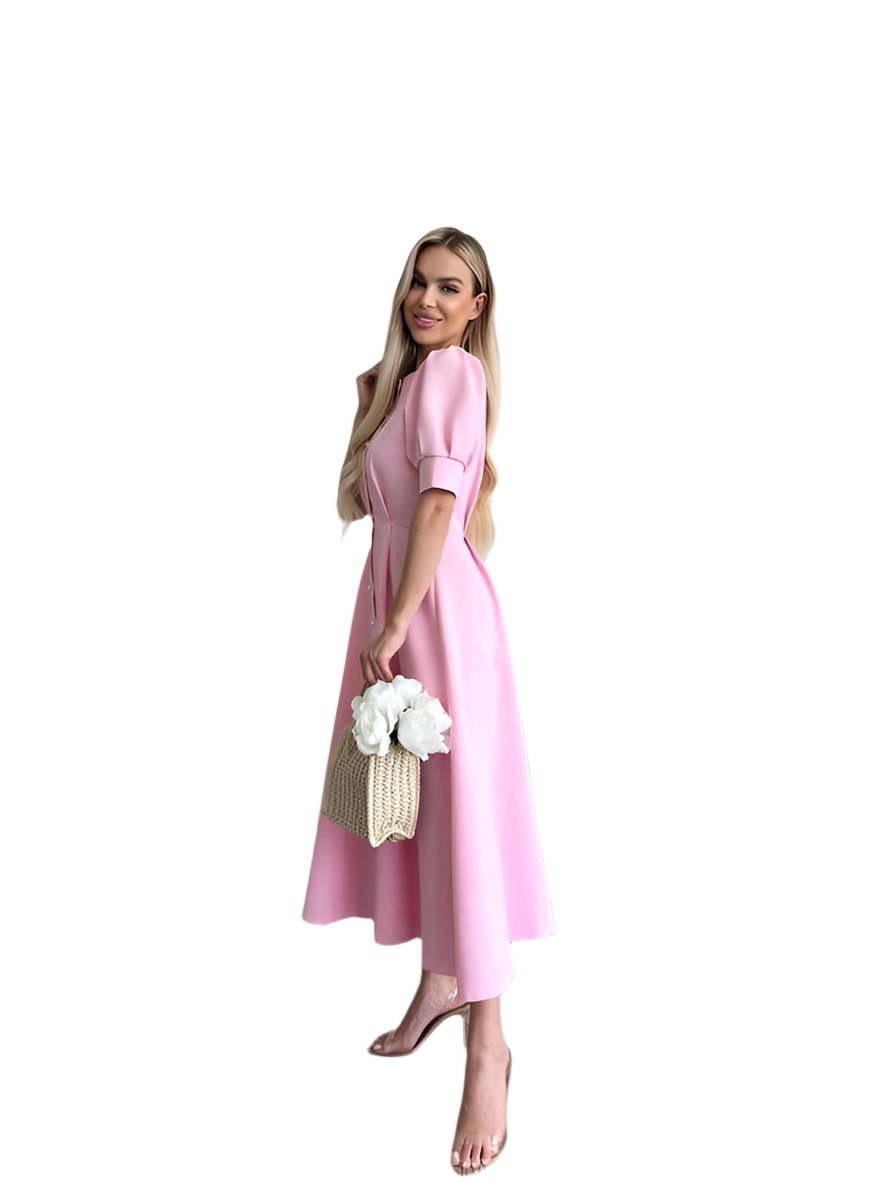Woman in a pink dress holding flowers and a bag on a white background