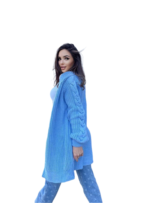 Woman wearing a long blue cardigan on a white background