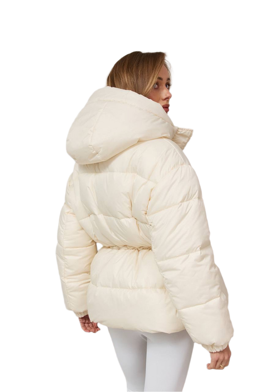 Woman wearing a white puffer jacket on a white background