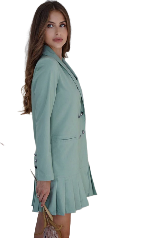 Woman wearing a light green blazer and skirt set on a white background