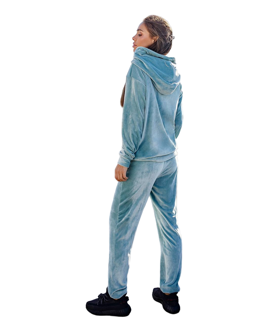 Person wearing a blue tracksuit on a white background