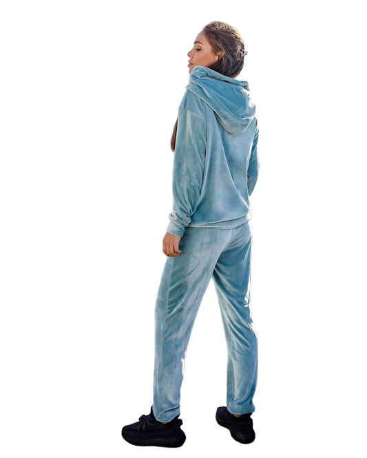 Person wearing a blue tracksuit on a white background