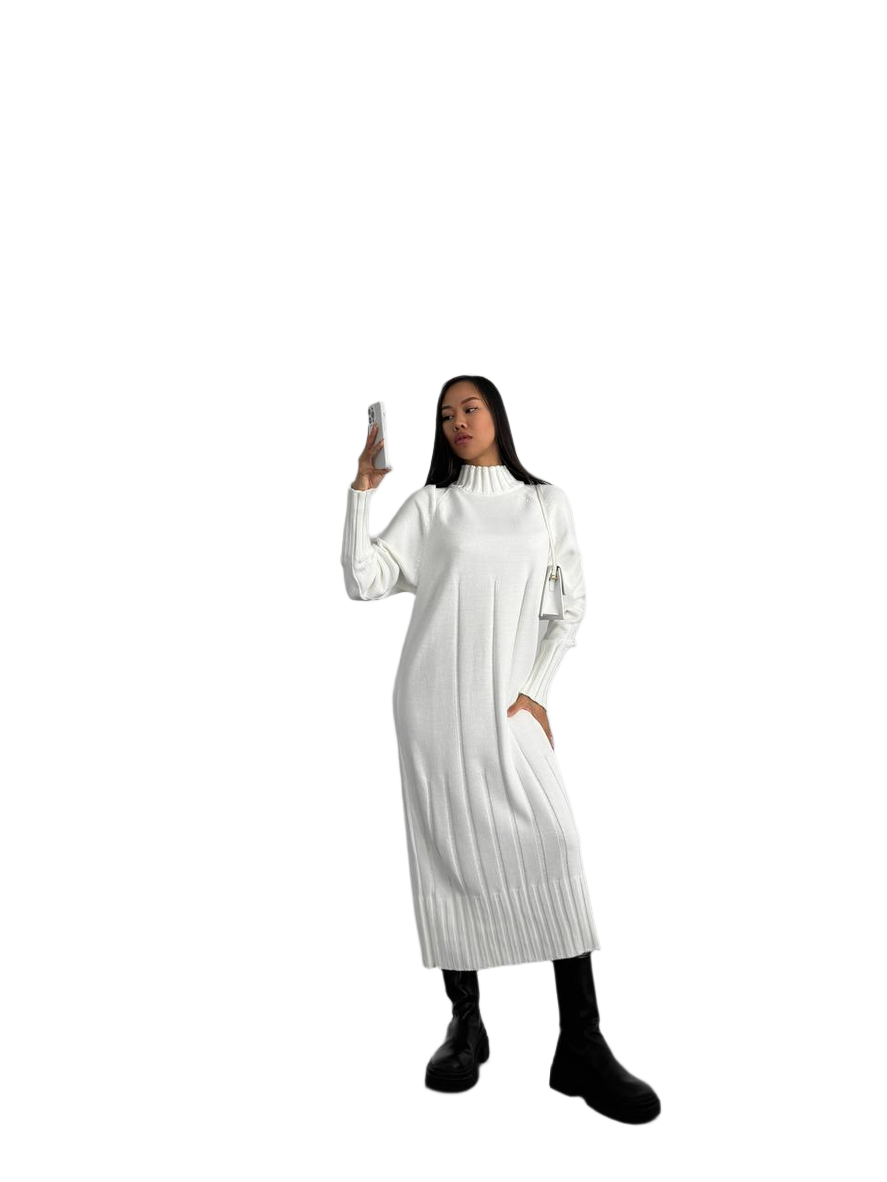 Person wearing a white dress with long sleeves on a white background