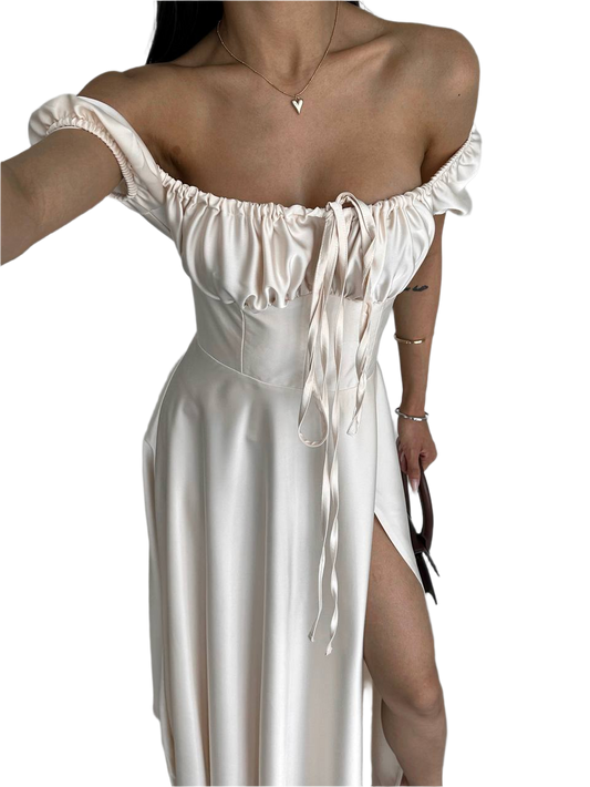 White off-shoulder dress with a heart-shaped cutout on a white background