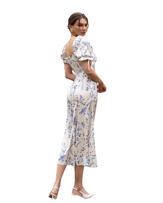 Woman wearing a floral dress on a white background