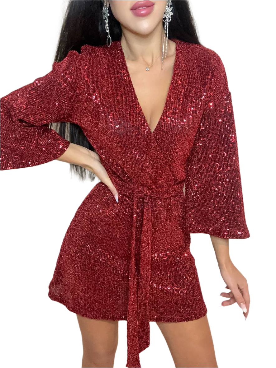 Red sequin dress worn by a model on a white background