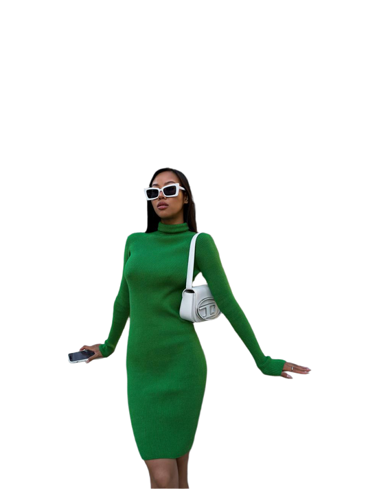 Woman wearing a green dress with a white handbag on a white background