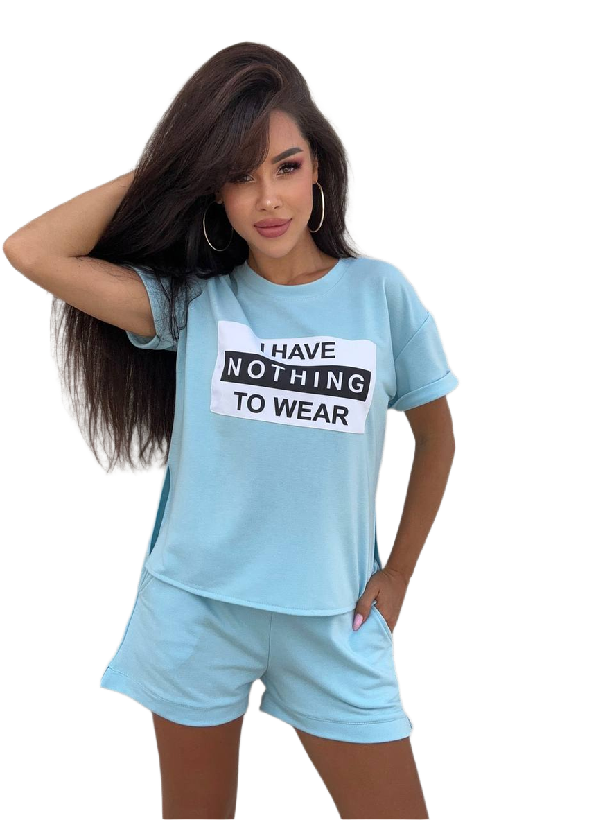Woman wearing a light blue t-shirt with text and matching shorts on a white background
