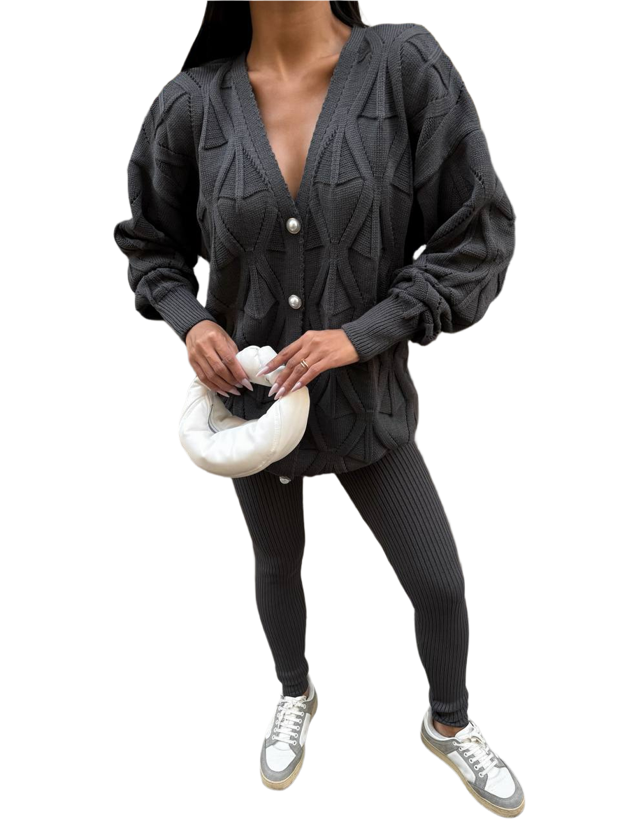 Person wearing a dark gray cardigan and leggings set on a white background