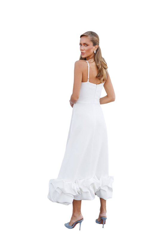 Woman wearing a white dress on a white background