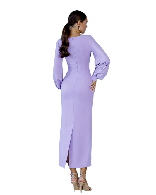 Woman wearing a long-sleeve lavender dress on a white background