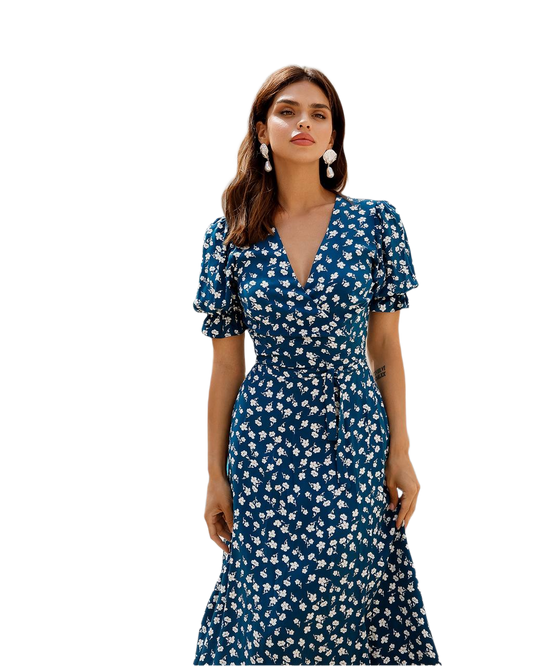 Woman wearing a blue floral dress on a white background