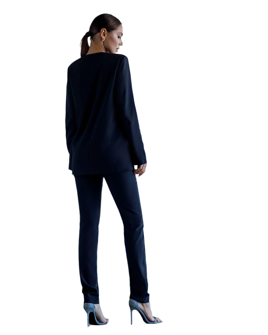 Woman wearing a navy suit on a white background