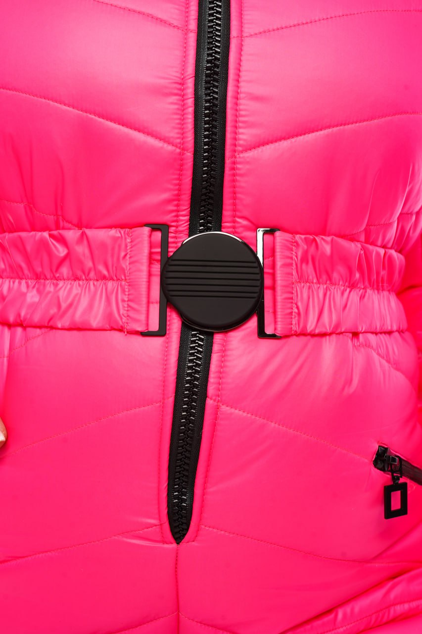Close-up of a bright pink puffer jacket with a black zipper.