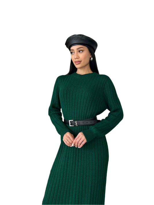 Woman wearing a green ribbed dress with a black belt and hat on a white background