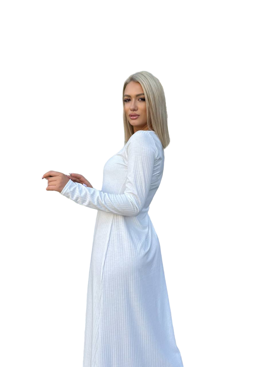 Woman wearing a white long-sleeve dress on a white background