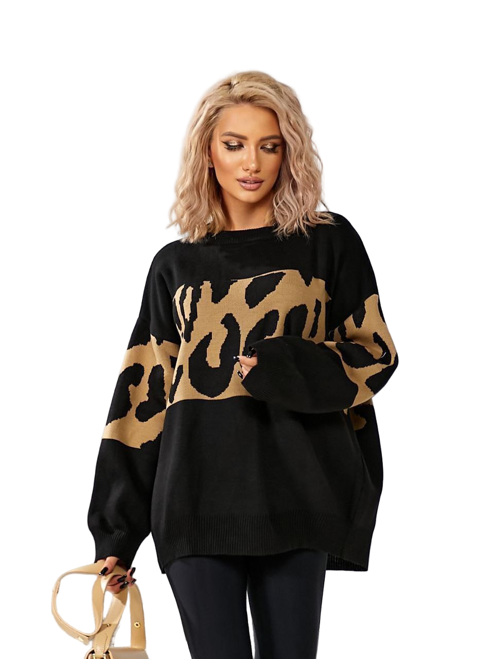 Woman wearing a black sweater with a gold leopard print pattern on a white background