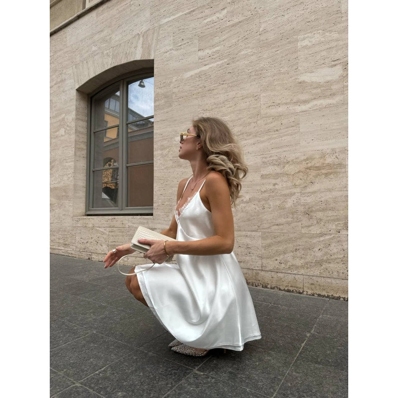 Elegant White Silk Slip Dress with Lace Detail and Back Cutout