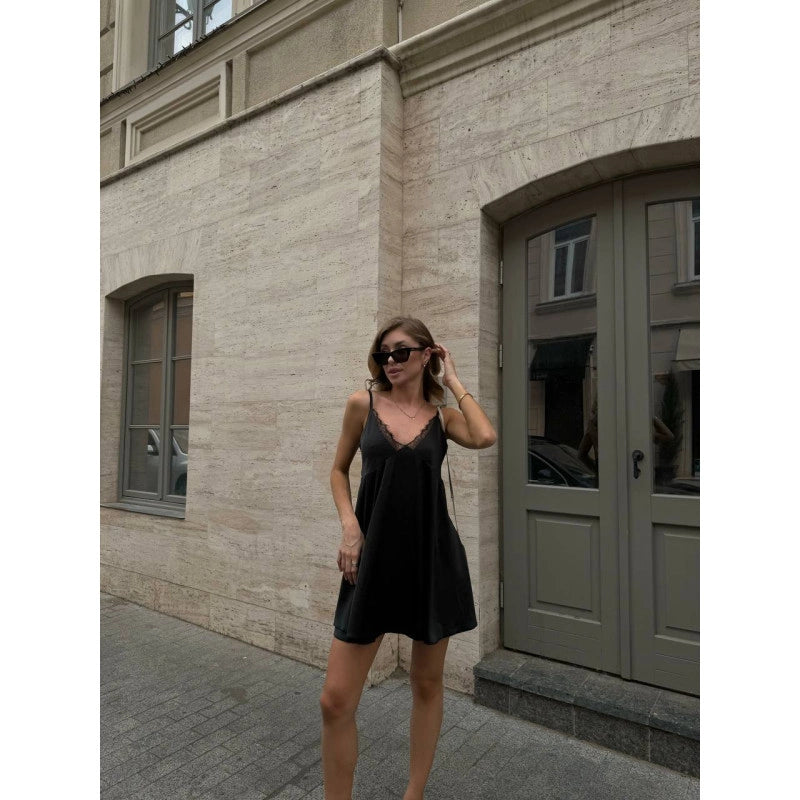Elegant Black Slip Dress with Lace Details and Back Cutout