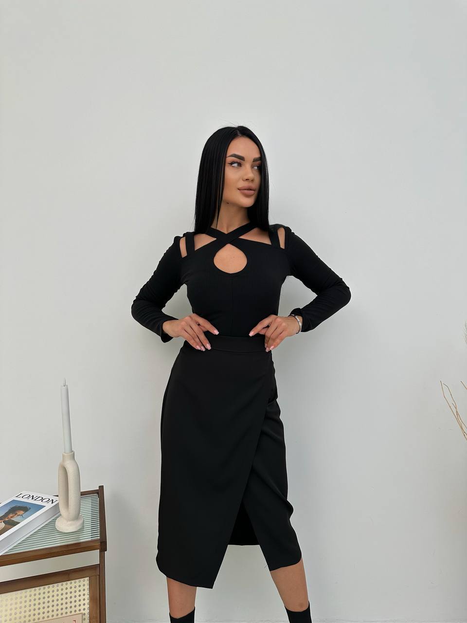 Black Ribbed Knit Blouse with Cutout Design