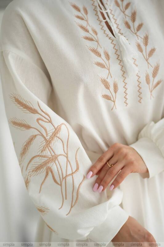 White Linen Embroidered Dress with Flared Skirt and Tassel Neckline