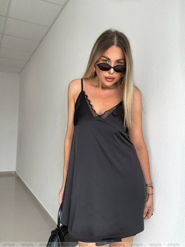 Elegant Black Slip Dress with Lace Details and Back Cutout