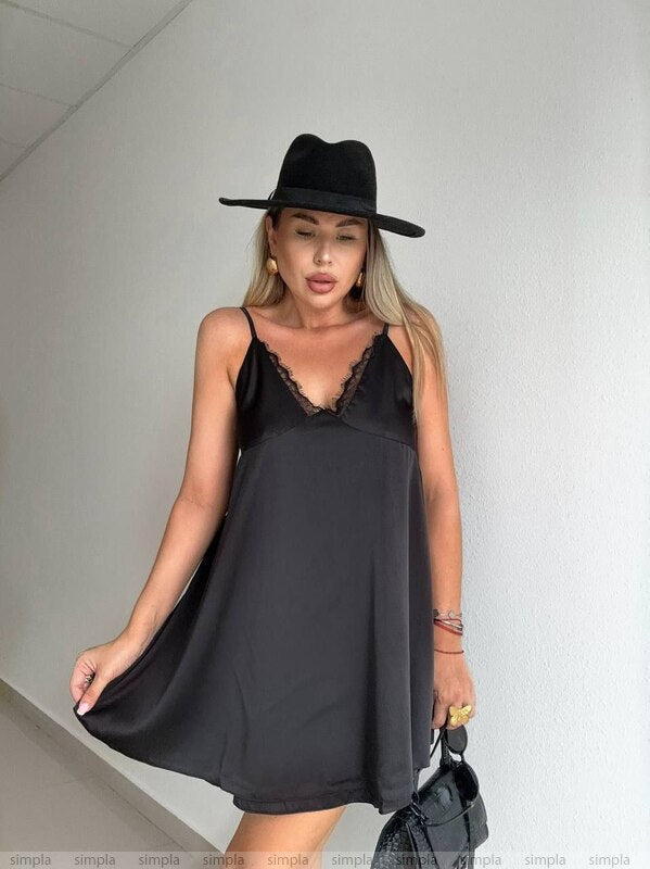 Elegant Black Slip Dress with Lace Details and Back Cutout