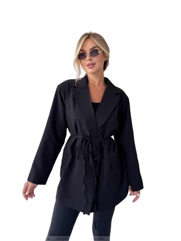 Woman wearing a black coat on a white background