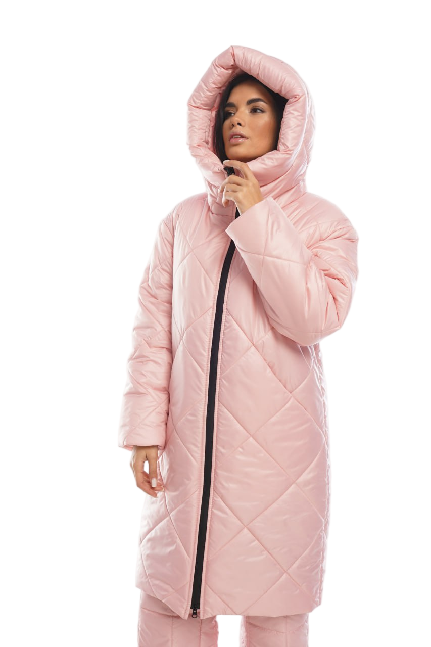 Woman wearing a pink quilted coat on a white background