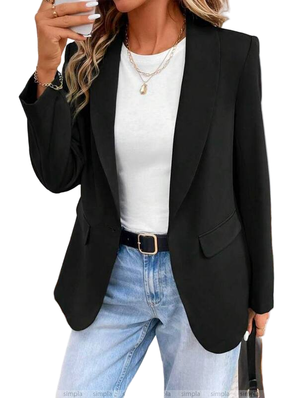 Person wearing a black blazer, white top, and blue jeans on a white background