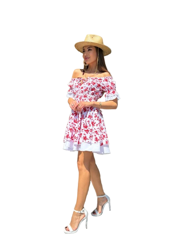 Woman wearing a floral off-shoulder dress and straw hat on a white background