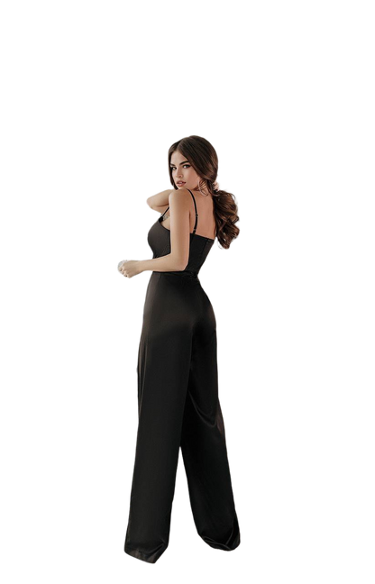 Woman wearing a black jumpsuit on a white background