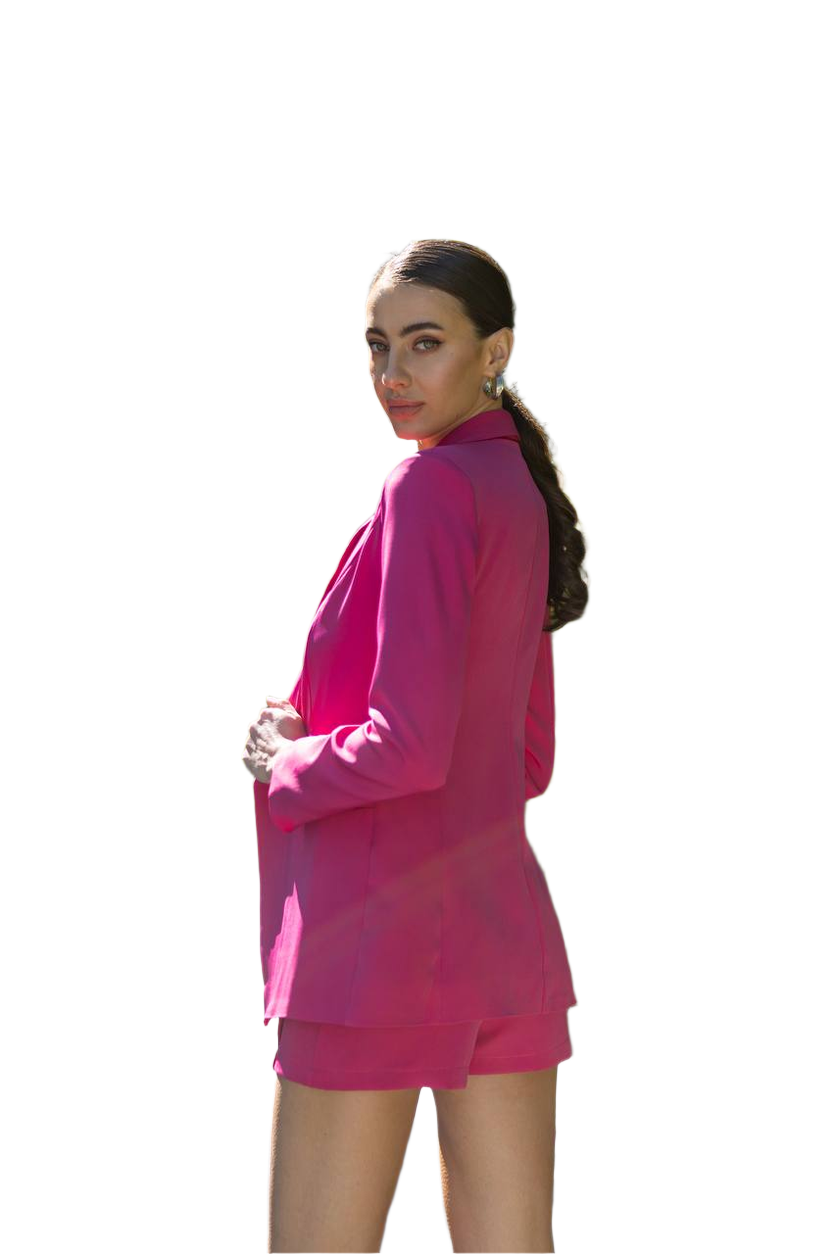 Woman wearing a pink outfit on a white background