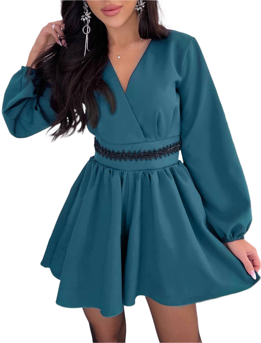 Teal dress with long sleeves on a white background
