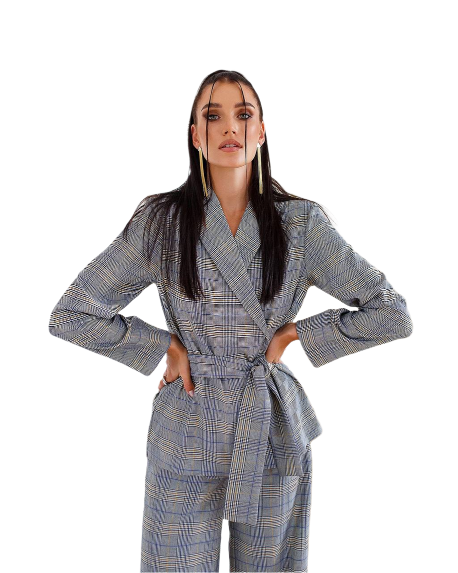 Woman wearing a blue checkered coat and pants on a white background