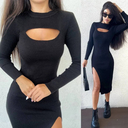 Black ribbed dress with cut-out design worn by a model against a white wall.
