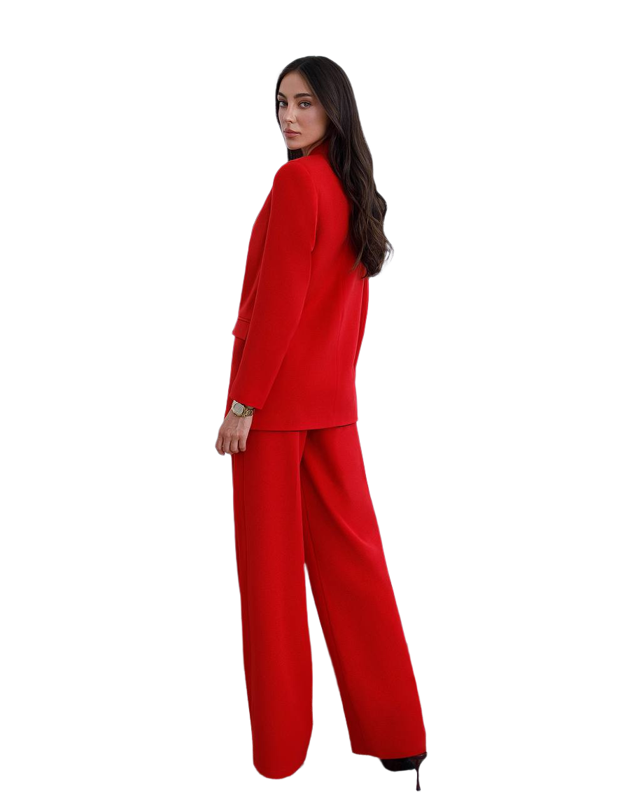 Woman wearing a red suit on a white background
