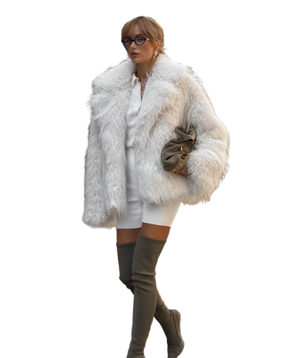 Person wearing a white fur coat on a white background