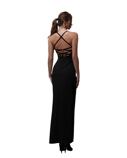 Black evening gown with criss-cross back design on a white background